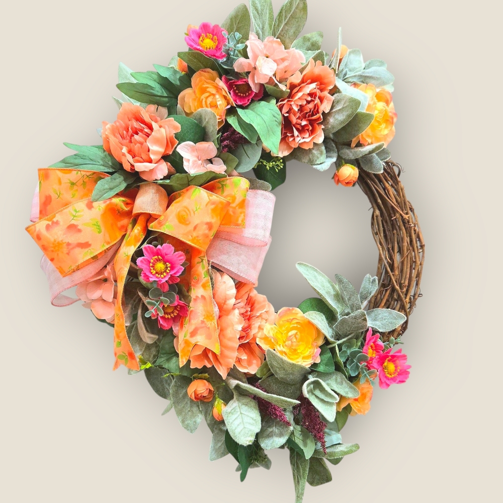 Peach and Pink Holiday Wreath with Festive Ribbon